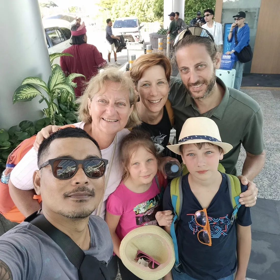 Family with Mougly at Bali airport pickup